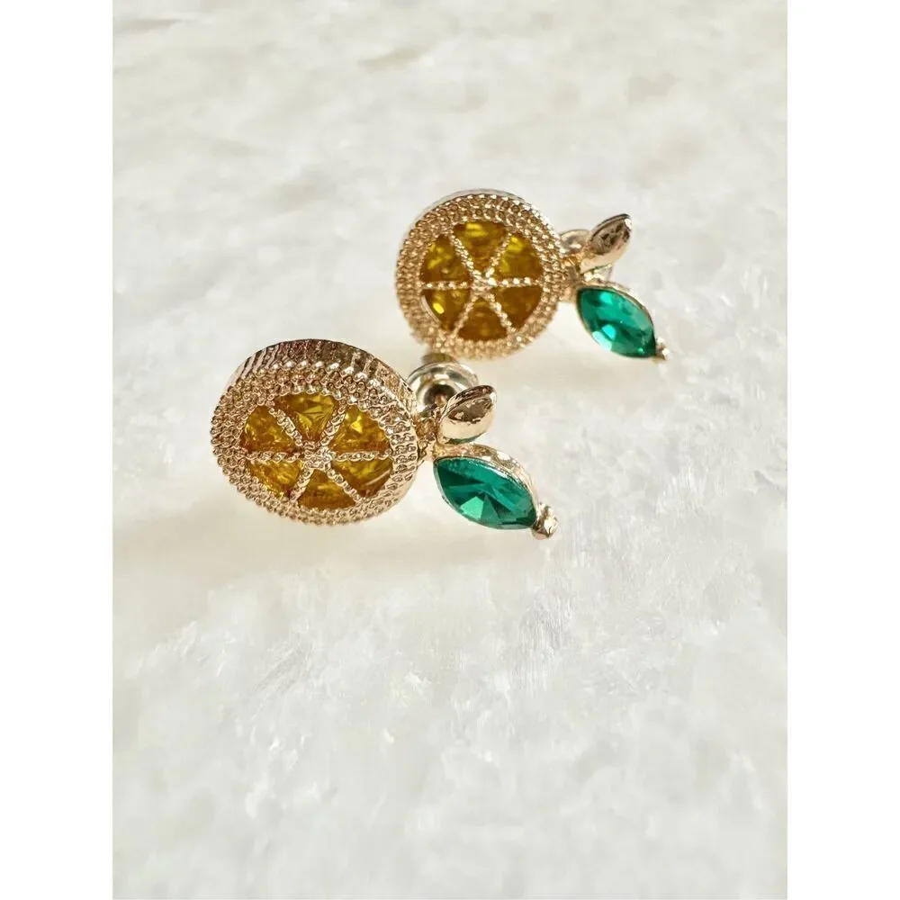Bright orange stud earring with green￼